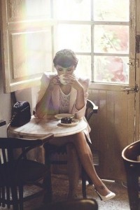 lady drinking coffee in cafe