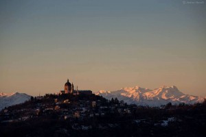 Superga on hill with mountain views in backdrop