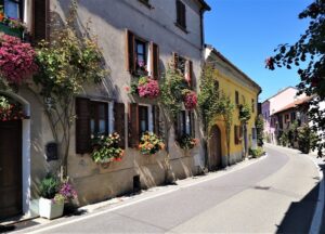 Picturesque Bossolasco village street with colourful houses in the Alta Langa